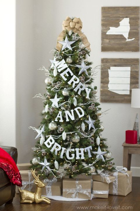 Beaded garland strands, spray-painted metal stars, and pinecone clusters cover this dazzling tree, but the main attraction is the bright, glittered letters hanging from jute string.<br>Get the tutorial at Make It and Love It.