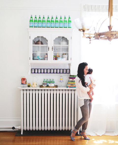 Only the top cabinets were utilized to create a cute storage spot for loose leaf tea and kettles (the bottom became a lovely bathroom vanity!). The radiator offers the shelving an anchor and acts as a tabletop. Get the tutorial at Le Zoe Musings » 