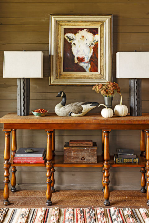 No need to go overboard: Place two small white pumpkins on an entryway table to greet guests with a smattering of fall spirit.
