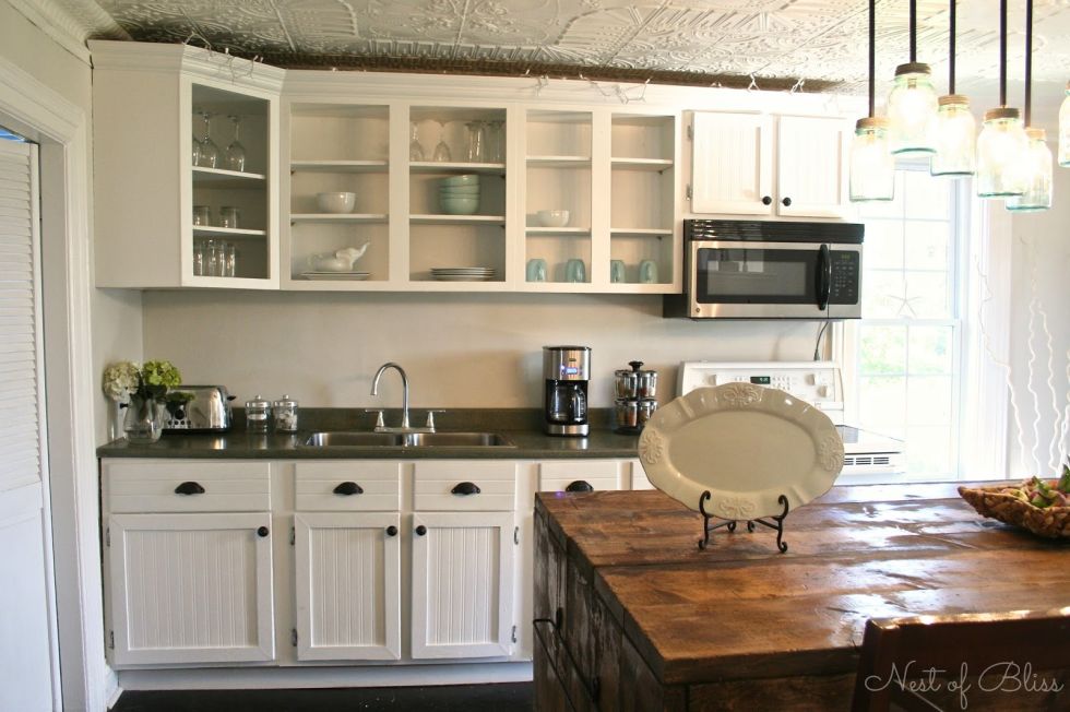 10 diy kitchen cabinet makeovers - before & after photos that