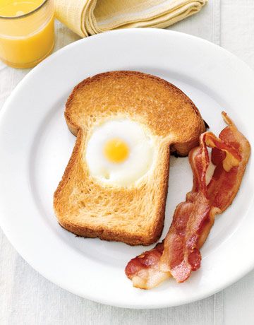 This hole-in-one beauty begins with a thick slice of buttered brioche bread. The freshest eggs will have centered, golden yolks and the best flavor. Drop in a jumbo egg and cook until the bread is toasted and the egg is set. Pair with bacon or roasted tomatoes. Recipe: Egg-in-the-Hole 