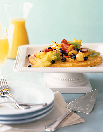 Fluffed and puffed up with the leavening power of farm-fresh eggs, this lightly sweetened omelet-like pancake for two is topped with cardamom-scented tropical-fruit salad. Recipe: Puffed Pancake with Cardamom-Fruit Salad 