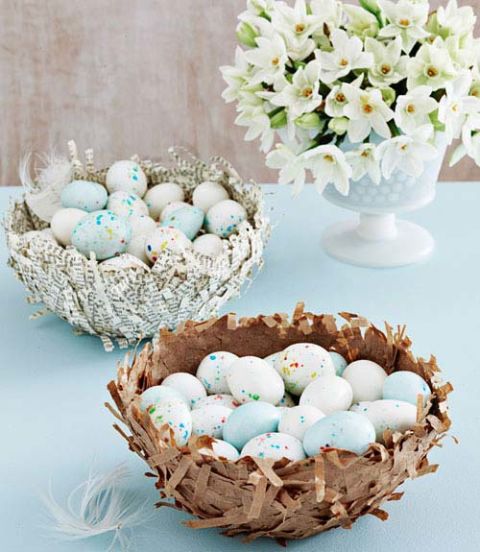 Take a page from the grade-school activity book with these delicate candy dishes, made using shredded brown lunch bags and sheets from an old dictionary. You can also use these nests to corral your decorated Easter eggs.
Step 1: Tightly cover a small bowl with plastic wrap, then flip the bowl upside down on wax paper. In another container, mix equal parts water and clear glue.
Step 2: Dip handfuls of shredded paper into the glue mixture, then immediately lay them on the bowl until it's covered.
Step 3: Lightly press dry paper strips along the outside to create a "nesty" look.
Step 4: Let dry for 12 hours; carefully pull the wrap off the bowl and away from the nest.