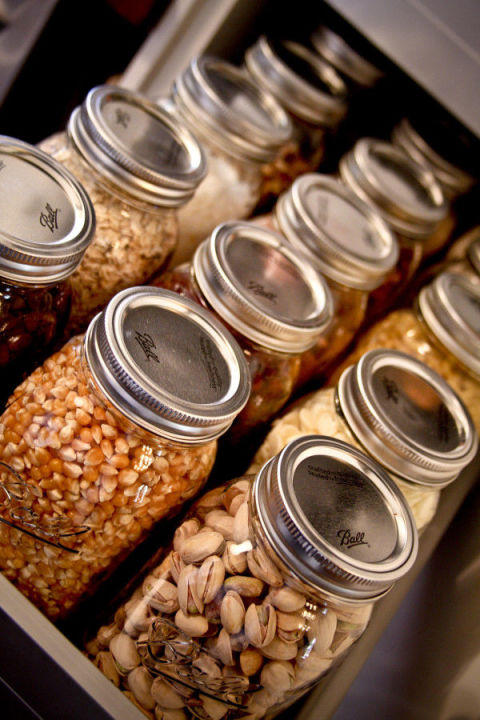 Store dry goods in quart-sized Mason jars for a cute and fun way to organize your pantry.