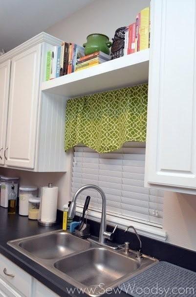 Cookbooks are so handy and cute, but who has space for them? Add a floating shelf on top of your cafe curtains to keep them nearby without using up valuable cabinet space (or blocking natural light).
See more at Sew Woodsy »
