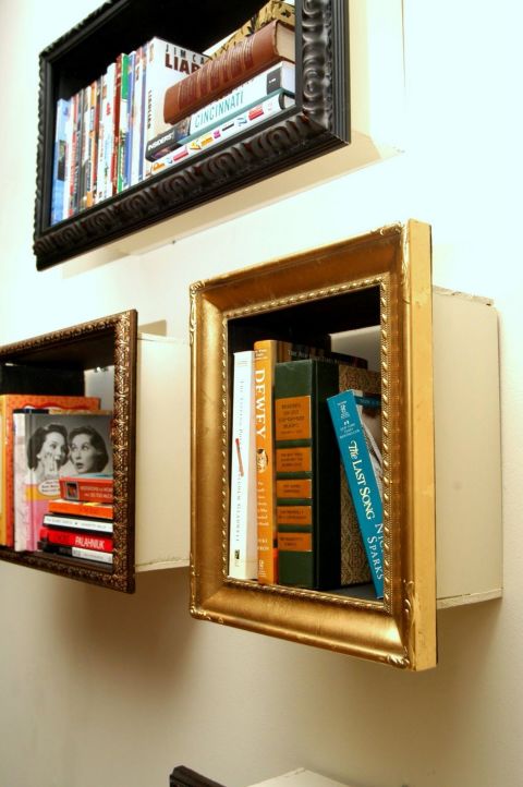 Adding wood to the backs of frames creates mini makeshift bookcases. Switch up the size and positioning of the frames, too, to create visual interest. 
Get the tutorial at Change of Scenery.
