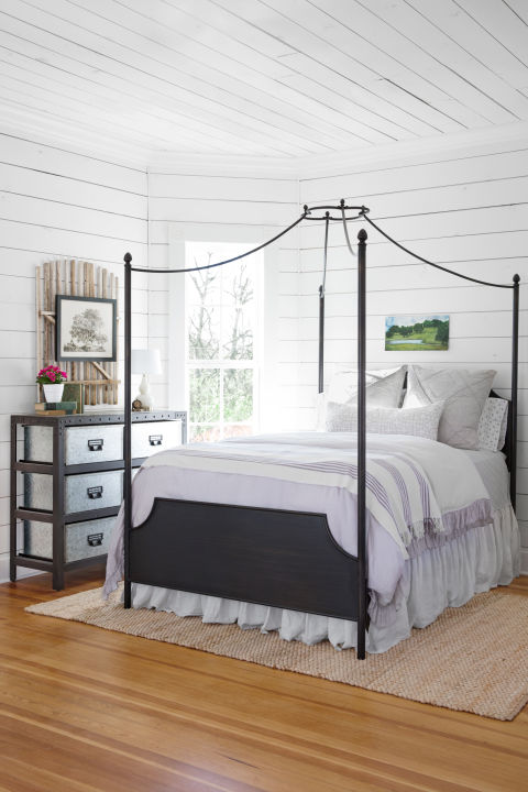 "If you want to do a white space, shiplap walls and ceilings are a great option because they add texture and character. We uncovered shiplap beneath the drywall, but if you want to add it to your home on a budget, consider just doing an accent wall, like the wall behind a bed." 